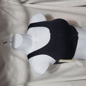 All In Motion. NWT. Medium Support. Black; Front Zipper Closure. Size S